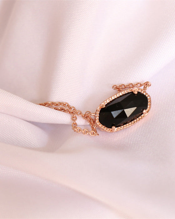 Elegant oval black glass rose quartz necklace