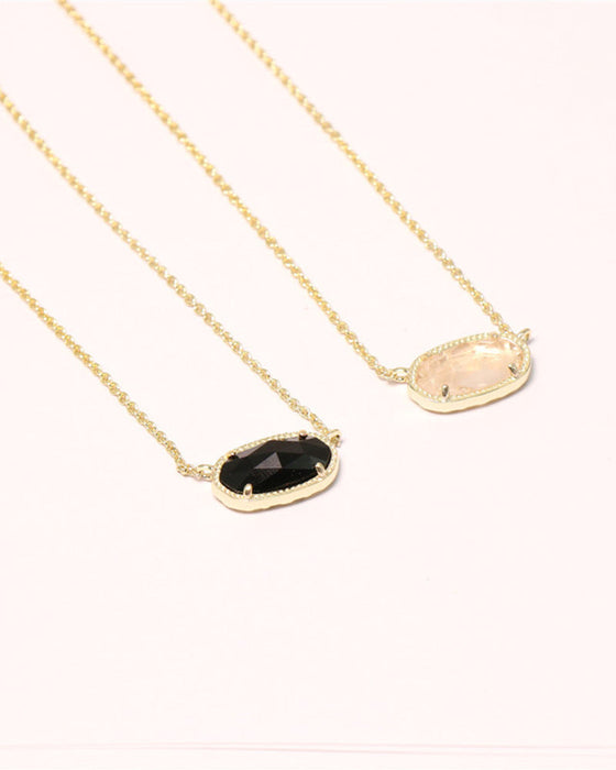 Elegant oval black glass rose quartz necklace