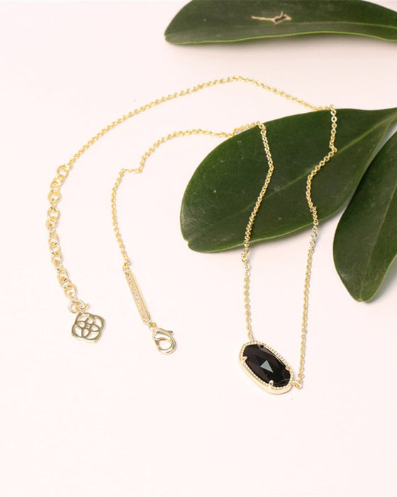 Elegant oval black glass rose quartz necklace