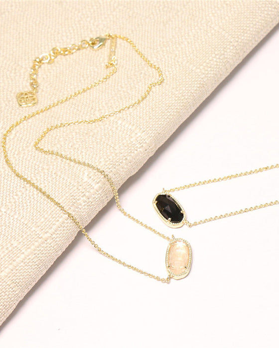 Elegant oval black glass rose quartz necklace