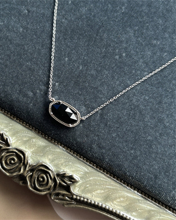 Elegant oval black glass rose quartz necklace