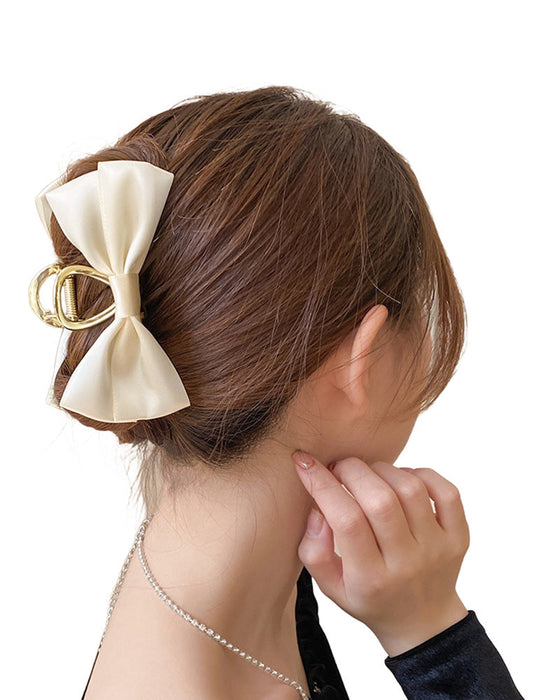 Temperament bow clip