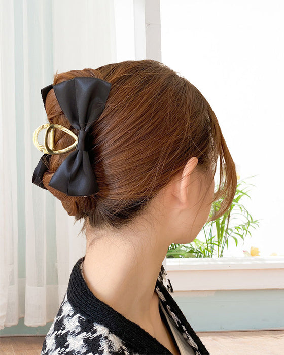 Temperament bow clip