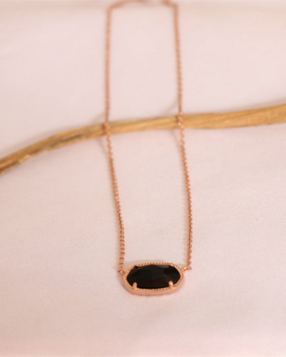 Elegant oval black glass rose quartz necklace