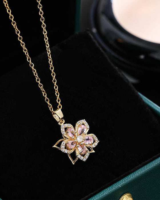 Five-petal flower 360° rotating pendant necklace