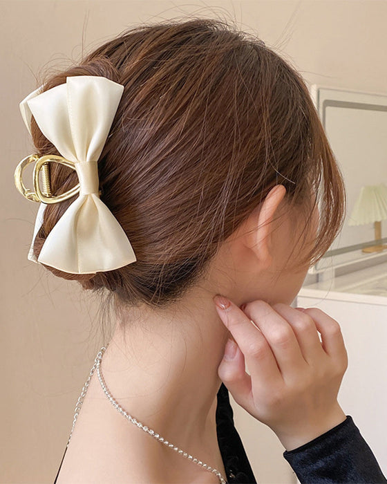 Temperament bow clip