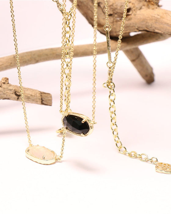 Elegant oval black glass rose quartz necklace