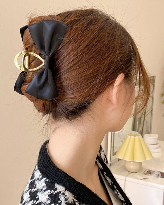 Temperament bow clip