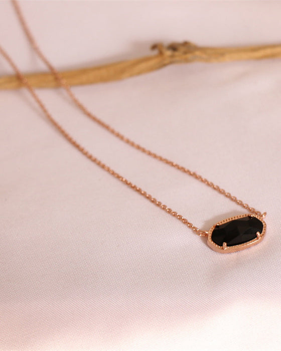 Elegant oval black glass rose quartz necklace